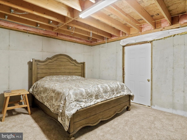 bedroom featuring light colored carpet