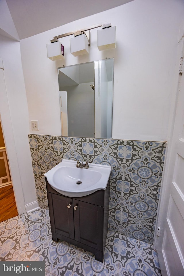 bathroom with vanity and tile patterned flooring