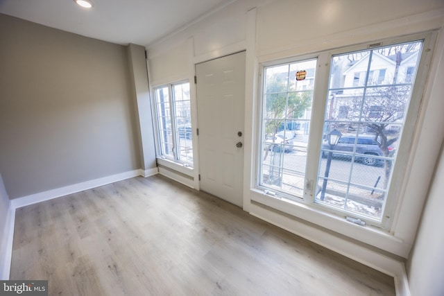 doorway with light hardwood / wood-style floors