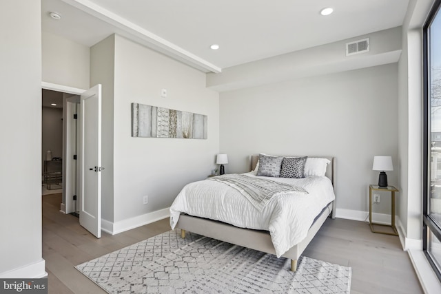 bedroom featuring light wood-type flooring