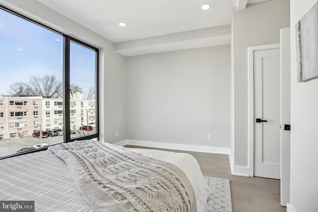 bedroom with light hardwood / wood-style floors