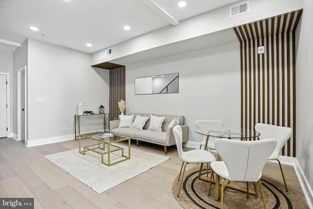 living room with light hardwood / wood-style floors