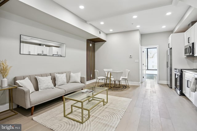 living room featuring light wood-type flooring