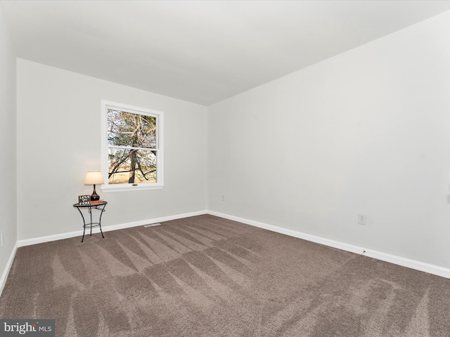 view of carpeted spare room