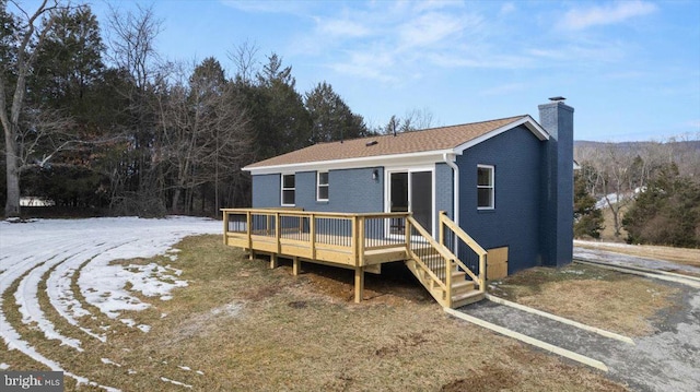 view of front of home with a wooden deck