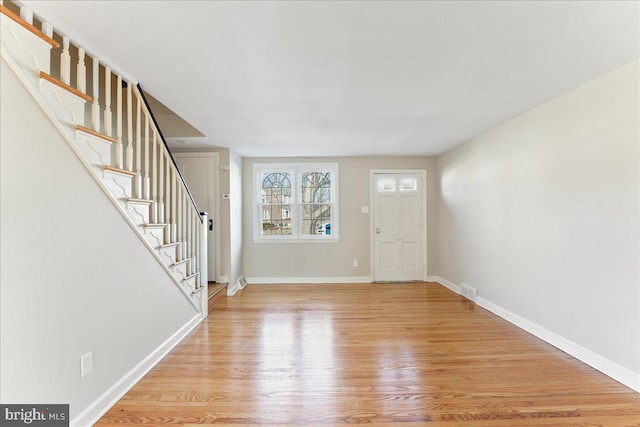 entrance foyer with light wood-type flooring