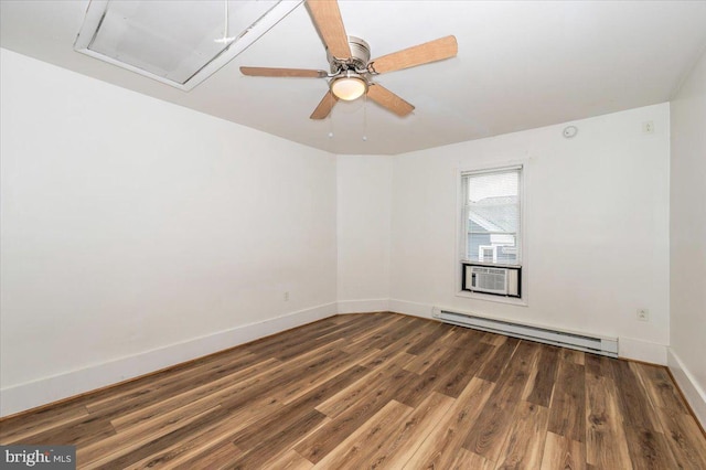 unfurnished room with ceiling fan, baseboard heating, baseboards, a wall mounted AC, and wood finished floors