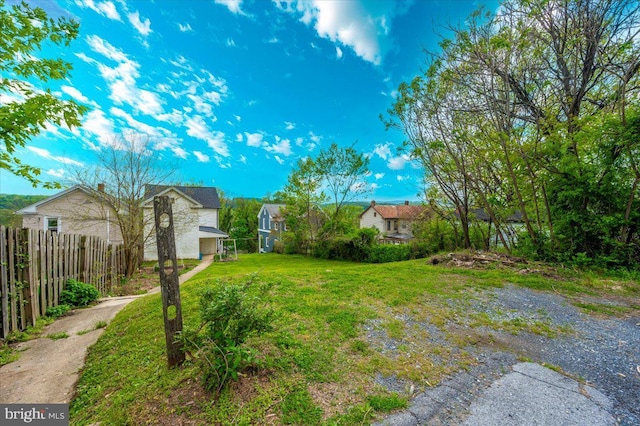 view of yard with fence