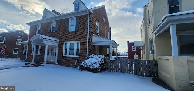 view of snow covered property