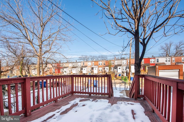 view of snow covered deck