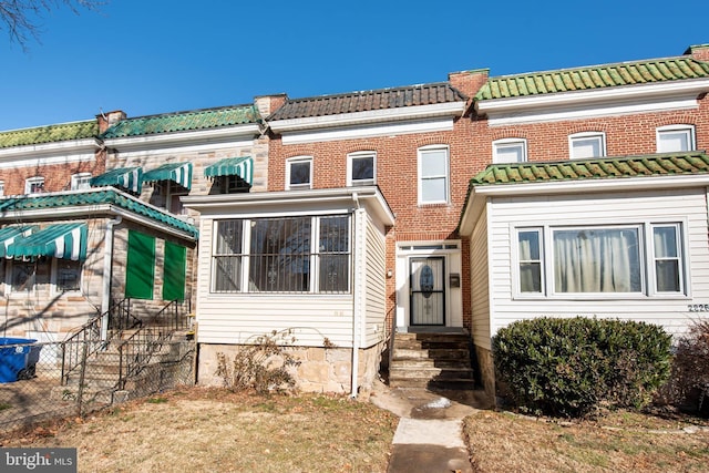 view of front of home with a front yard