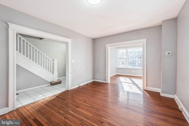 unfurnished room featuring light hardwood / wood-style floors