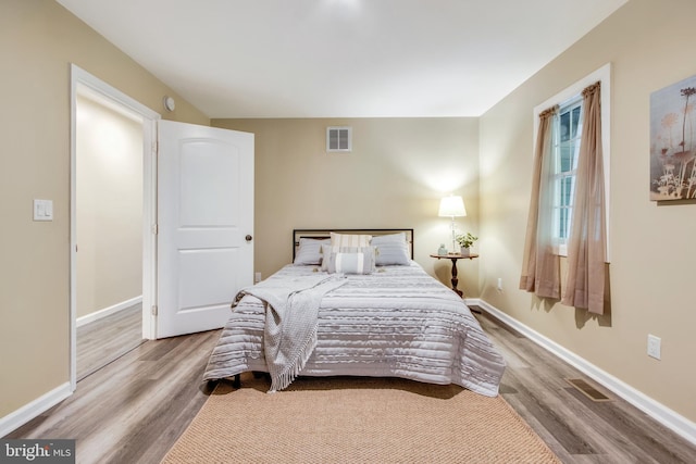 bedroom featuring light wood-type flooring