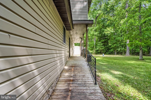 view of side of property with a yard