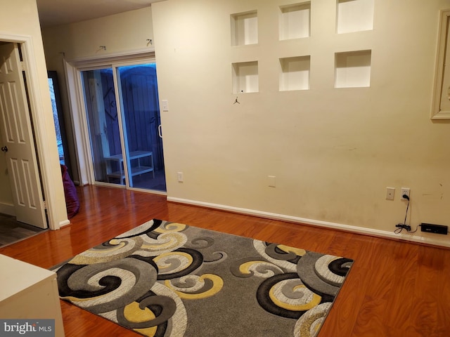 interior space with dark wood-type flooring