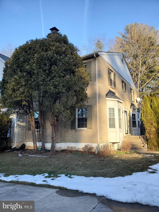 view of snow covered property