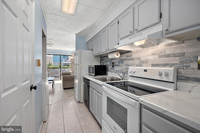 kitchen with gray cabinets, tasteful backsplash, dishwasher, sink, and white electric range oven