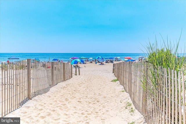 view of water feature featuring a beach view