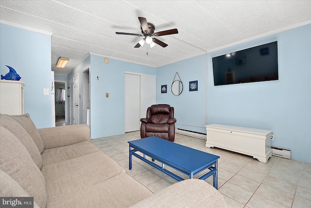 tiled living room featuring ceiling fan, ornamental molding, a textured ceiling, and a baseboard heating unit