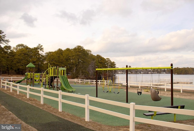 view of playground featuring a water view