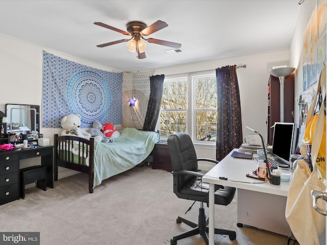 carpeted bedroom featuring ceiling fan