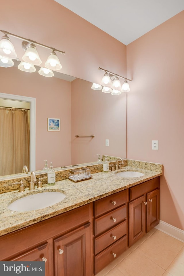 bathroom featuring vanity and tile patterned flooring