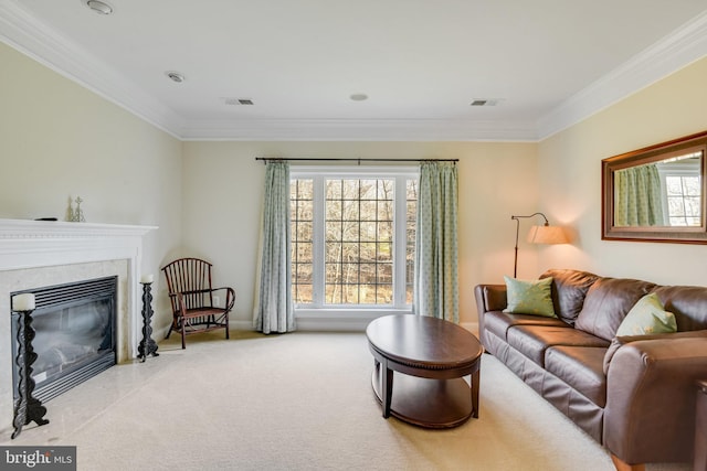 carpeted living room with ornamental molding and a fireplace