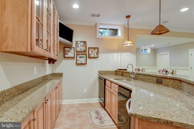 kitchen featuring sink, light stone counters, crown molding, decorative light fixtures, and light tile patterned floors