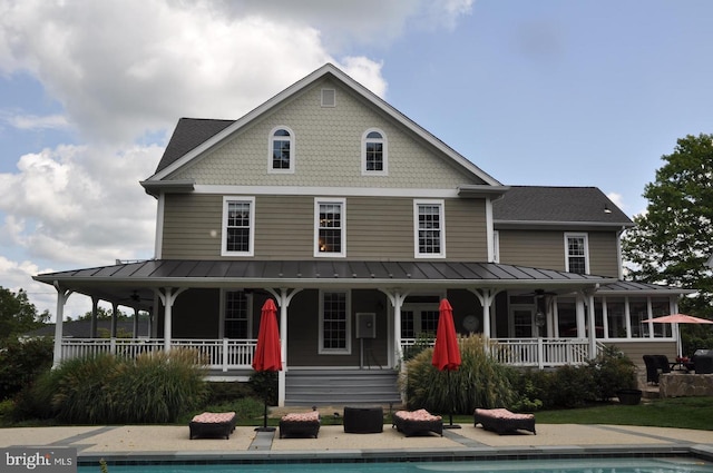 farmhouse-style home featuring a porch