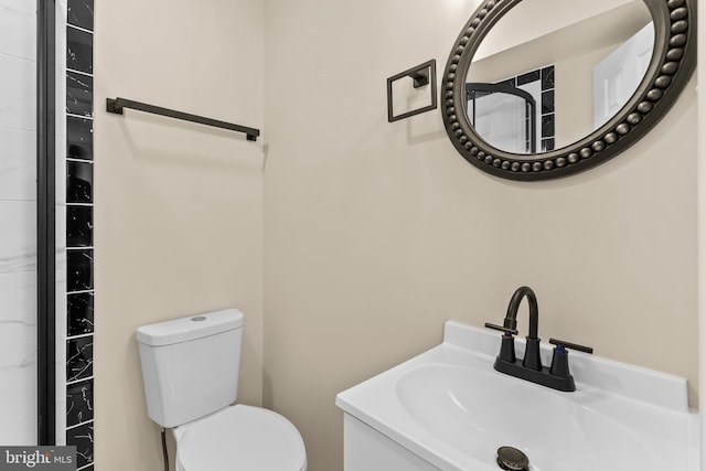 bathroom featuring sink and toilet