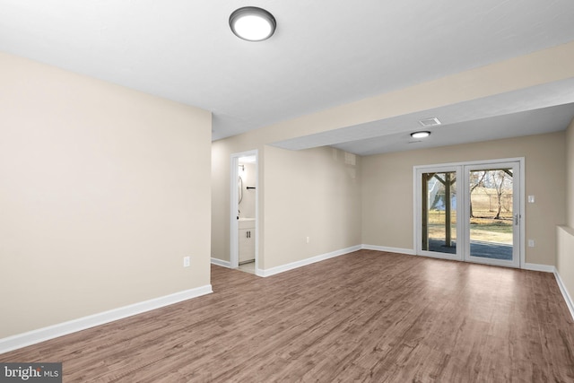 empty room featuring hardwood / wood-style floors