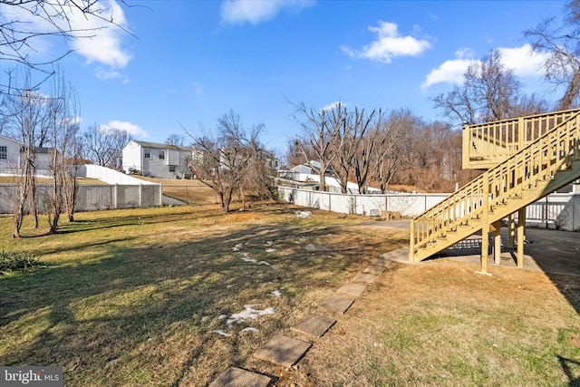 view of yard with a wooden deck