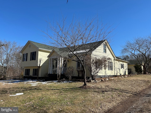 view of property exterior featuring a yard