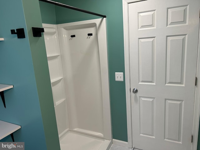 bathroom featuring a shower