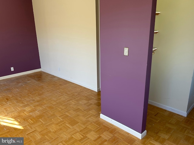 empty room with light parquet floors