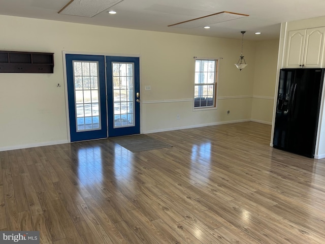 interior space featuring french doors and wood-type flooring