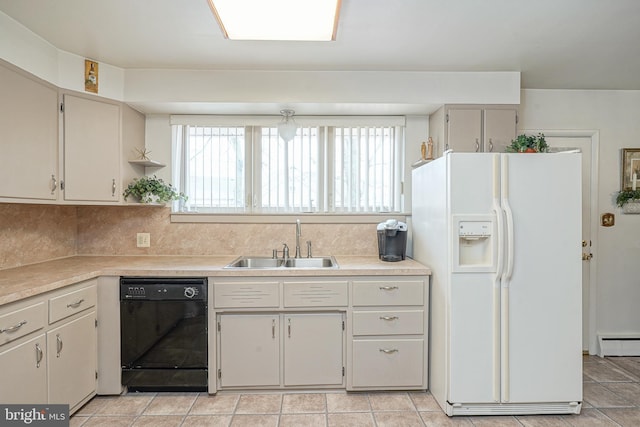 kitchen with white refrigerator with ice dispenser, dishwasher, a baseboard radiator, light countertops, and a sink