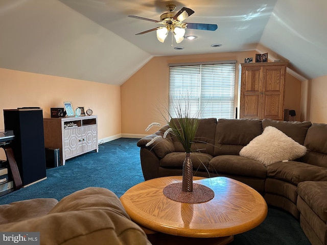 living room featuring dark carpet, vaulted ceiling, and ceiling fan