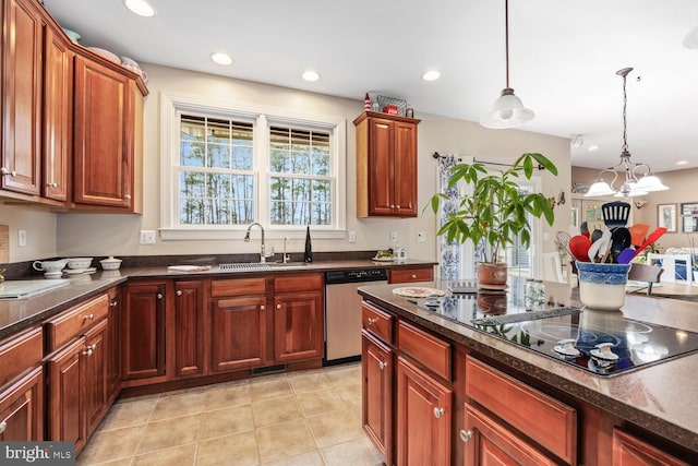 kitchen with pendant lighting, light tile patterned floors, sink, black electric stovetop, and stainless steel dishwasher