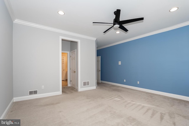 unfurnished bedroom featuring crown molding, light carpet, and ceiling fan