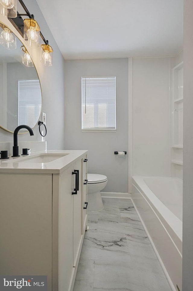 full bathroom featuring vanity, toilet, and bathing tub / shower combination