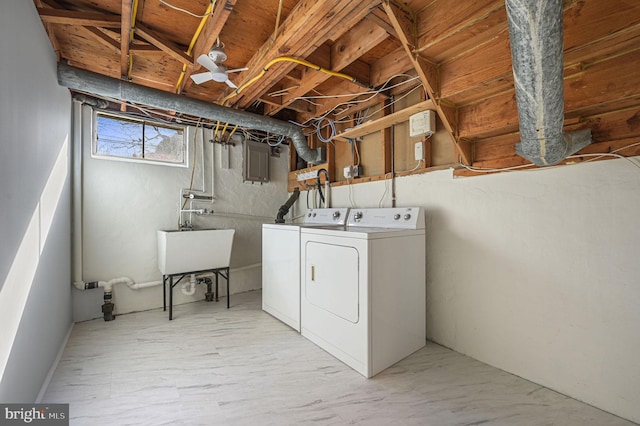 laundry area featuring sink and washing machine and clothes dryer