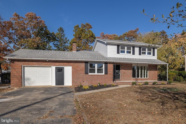 front of property featuring a garage