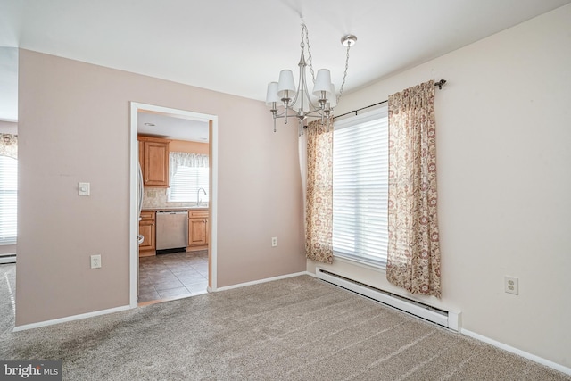 unfurnished room featuring an inviting chandelier, a baseboard heating unit, light colored carpet, and sink