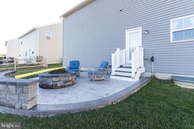 view of patio featuring an outdoor fire pit