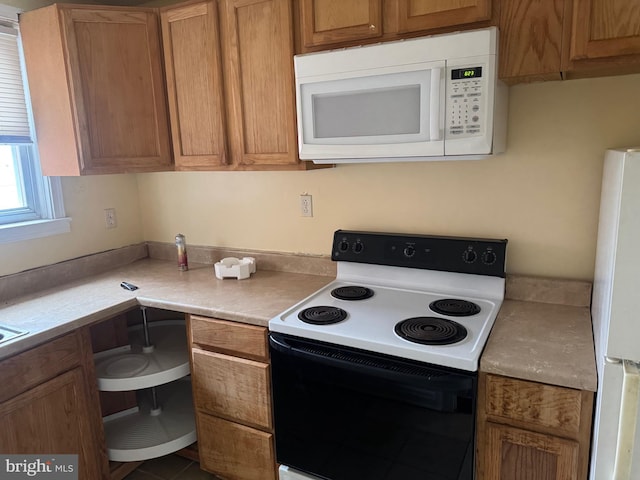 kitchen featuring white appliances