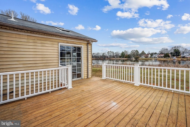 deck featuring a water view