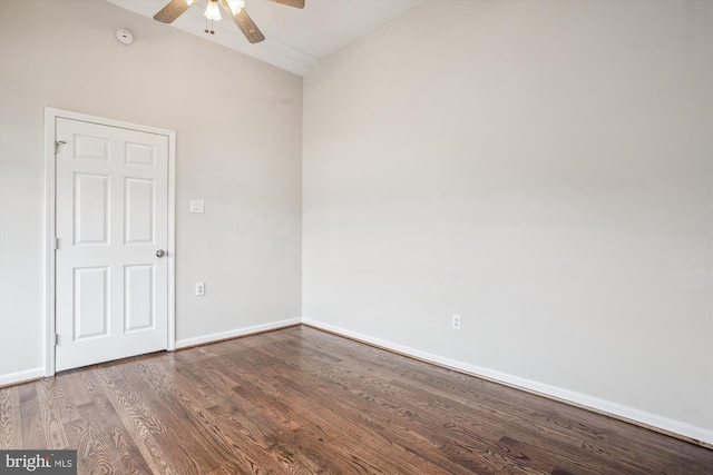 empty room featuring ceiling fan, wood finished floors, and baseboards