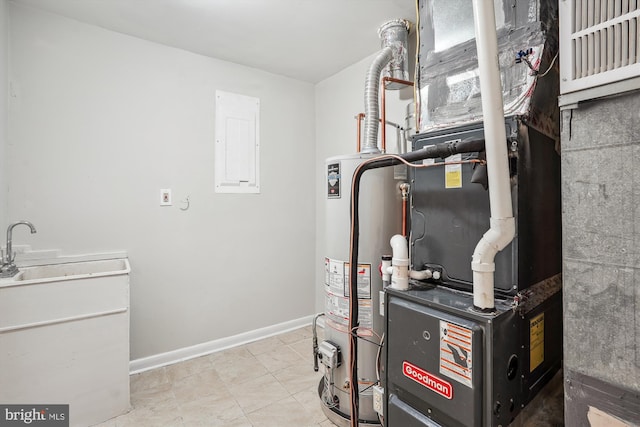 utilities featuring water heater and a sink