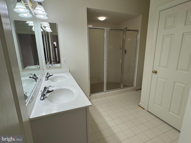 bathroom featuring walk in shower, tile patterned floors, and vanity